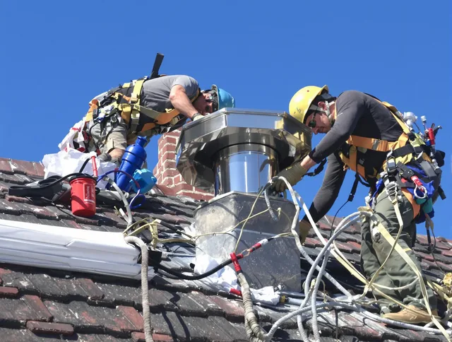 Protective chimney cap installed by Aurora Chimney Sweep in Aurora, OH
