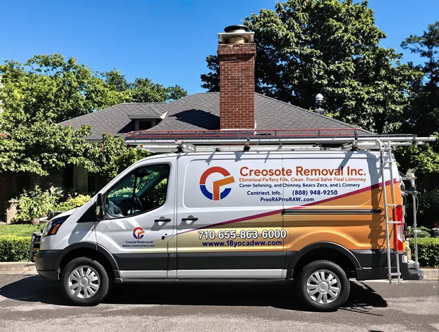 Aurora Chimney Sweep technician removing creosote safely in Aurora, OH