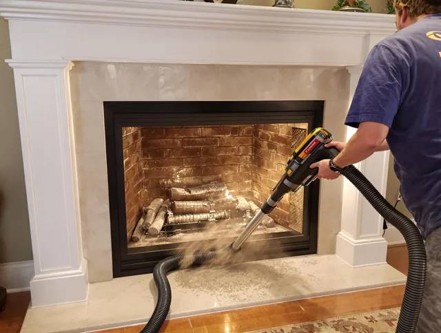 Fireplace cleaning performed by Aurora Chimney Sweep in Aurora, OH