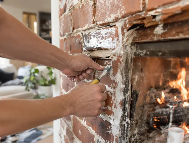 Routine fireplace repair by Aurora Chimney Sweep in Aurora, OH